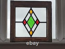 A Vivid Art Deco English Compact Stained Glass Panel With Diamond Design