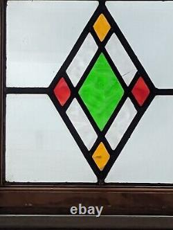 A Vivid Art Deco English Compact Stained Glass Panel With Diamond Design