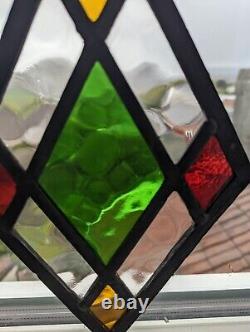 A Vivid Art Deco English Compact Stained Glass Panel With Diamond Design