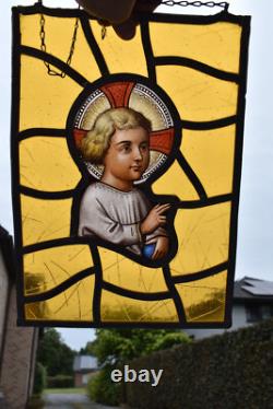 Antique religious stained glass window panel young jesus portrait