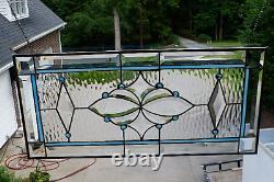 Aqua Stained glass and beveled window panel transom