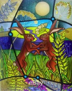 Dancing hares, Moon gazing hares. Stained glass style hand painted glass panels