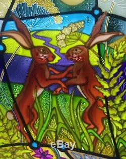 Dancing hares, Moon gazing hares. Stained glass style hand painted glass panels