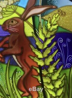 Dancing hares, Moon gazing hares. Stained glass style hand painted glass panels