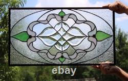 Exquisite Victorian-style stained glass panel, meticulously crafted with iridesc