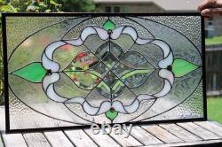 Exquisite Victorian-style stained glass panel, meticulously crafted with iridesc