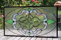 Exquisite Victorian-style stained glass panel, meticulously crafted with iridesc