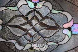 Exquisite Victorian-style stained glass panel, meticulously crafted with iridesc