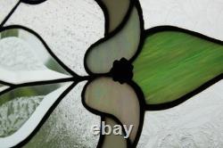 Exquisite Victorian-style stained glass panel, meticulously crafted with iridesc