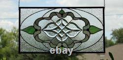 Exquisite Victorian-style stained glass panel, meticulously crafted with iridesc