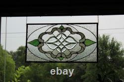 Exquisite Victorian-style stained glass panel, meticulously crafted with iridesc