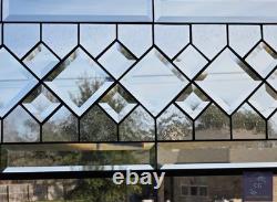 Extra-long clear beveled stained glass panel transom sidelight, measuring 48.75