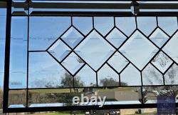 Extra-long clear beveled stained glass panel transom sidelight, measuring 48.75