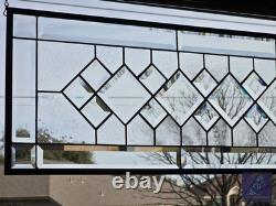 Extra-long clear beveled stained glass panel transom sidelight, measuring 48.75