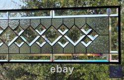 Extra-long clear beveled stained glass panel transom sidelight, measuring 48.75