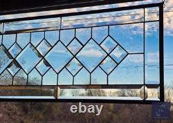 Extra-long clear beveled stained glass panel transom sidelight, measuring 48.75