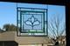 Hanging stained glass window panel with beveled edges, obscure textured glass