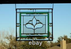 Hanging stained glass window panel with beveled edges, obscure textured glass