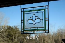 Hanging stained glass window panel with beveled edges, obscure textured glass