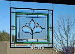 Hanging stained glass window panel with beveled edges, obscure textured glass