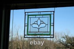 Hanging stained glass window panel with beveled edges, obscure textured glass