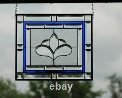 Hanging stained glass window panel with beveled edges, obscure textured glass