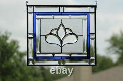 Hanging stained glass window panel with beveled edges, obscure textured glass