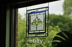 Hanging stained glass window panel with beveled edges, obscure textured glass