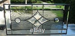 Stained Glass Panel and Beveled Transom withGray Background