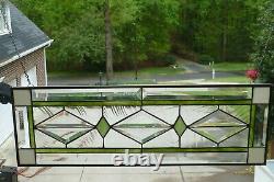 Stained Glass and Beveled Window Transom with Green & White Trim