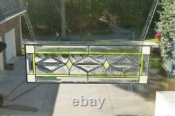 Stained Glass and Beveled Window Transom with Green & White Trim