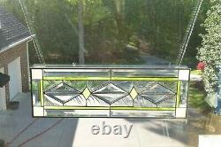 Stained Glass and Beveled Window Transom with Green & White Trim