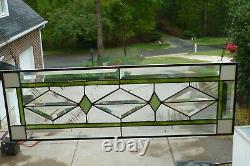 Stained Glass and Beveled Window Transom with Green & White Trim