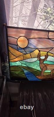 Stained glass panel featuring a buck in a landscape setting, Tiffany Style