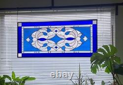 Stained glass panel featuring a cobalt blue contemporary star, 40.75x18.75