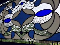 Stained glass panel featuring a cobalt blue contemporary star, 40.75x18.75