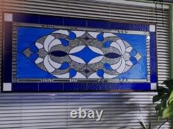 Stained glass panel featuring a cobalt blue contemporary star, 40.75x18.75
