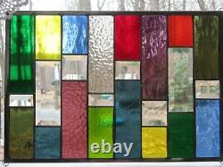 Stained glass panel with bevels and rainbow colors