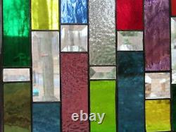 Stained glass panel with bevels and rainbow colors