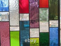 Stained glass panel with bevels and rainbow colors