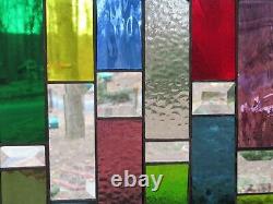 Stained glass panel with bevels and rainbow colors