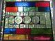 Stained glass panel with clear glass bevels and rainbow colors