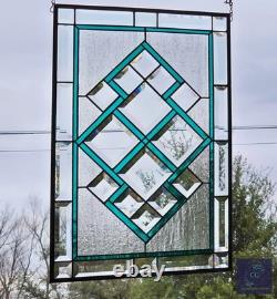 Teal green stained glass window panel with beveled, hanging 23 1/2x 15 5/8