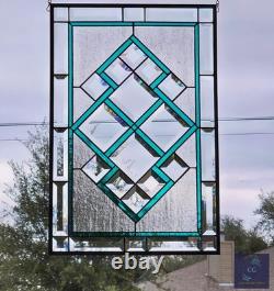 Teal green stained glass window panel with beveled, hanging 23 1/2x 15 5/8