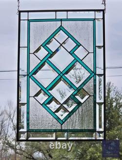 Teal green stained glass window panel with beveled, hanging 23 1/2x 15 5/8